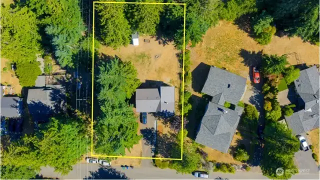 Big yard energy! With nearly half an acre and a fully fenced backyard, there’s plenty of room to grow your dream garden, give your pups space to zoom, or even build out your backyard chicken empire.