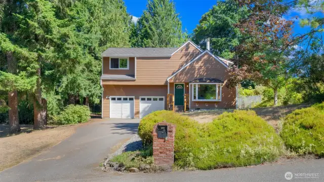From the moment you pull up, the brick-column mailbox hints at the care and quality you'll find throughout the neighborhood. It's the kind of place where pride of ownership shows.