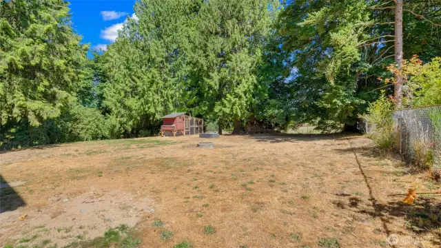 What a yard - huge, open, and wonderfully private. Whether you're dreaming of garden beds, backyard games, or just soaking up the quiet, this space delivers.