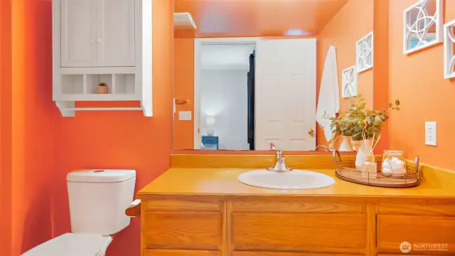 The bold orange energy of this ensuite brings instant sunshine - no matter what the weather’s doing outside. It’s bright, it’s fun, and it’s guaranteed to start your day with a smile.