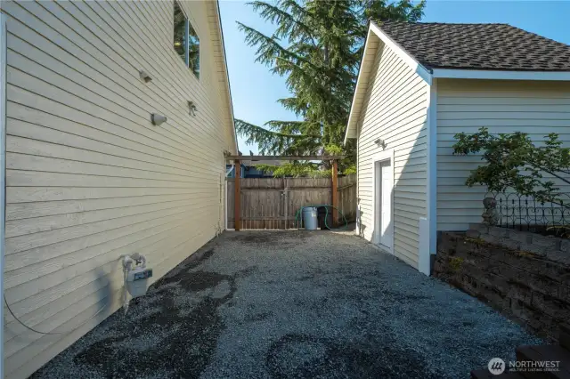 Full view of double gated backyard access area.
