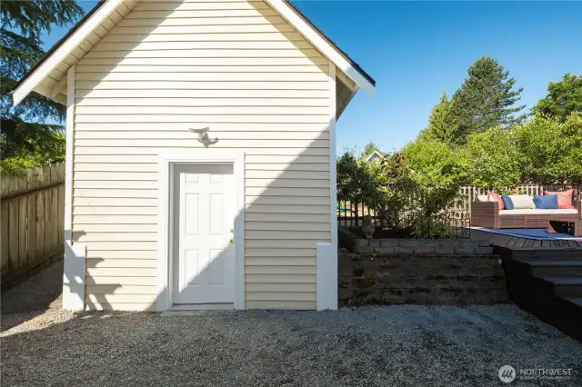 Huge shed for tons of storage. Designed with a window dormer to match the home!