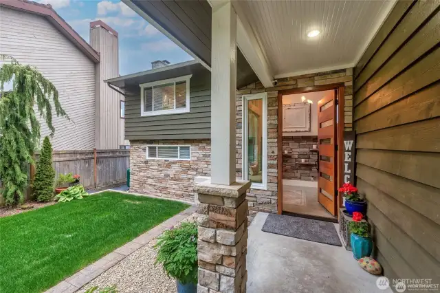 Step through the solid wood door into an interior filled with natural textures.