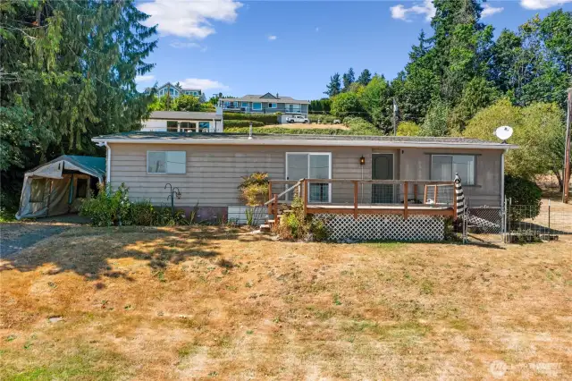 Manufactured 2 bedroom 2 bath home on sewer and water 2 lots together both can be built on
