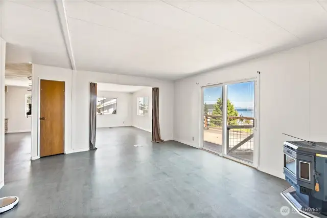Family Room with sliding door and deck for view and outdoor entertaining