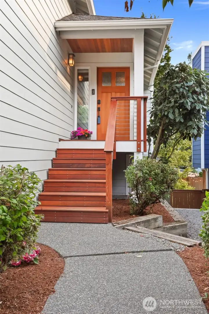 Another recent upgrade is the modern front porch and steps made out of attractive Ipe wood.