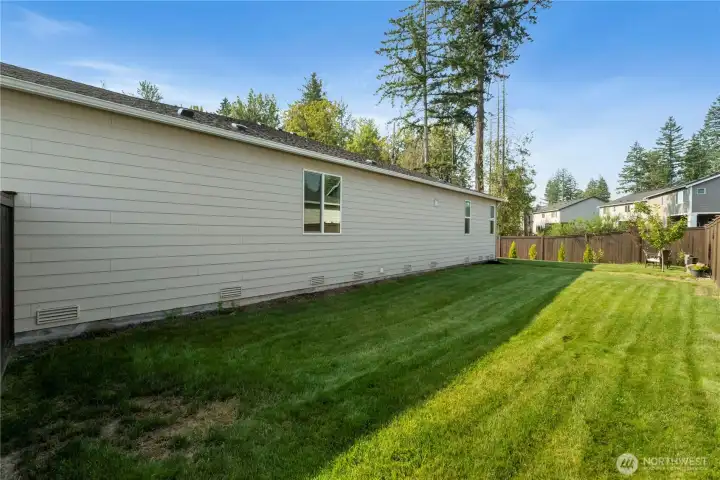 Huge yard fully fenced AND has irrigation alreaday installed