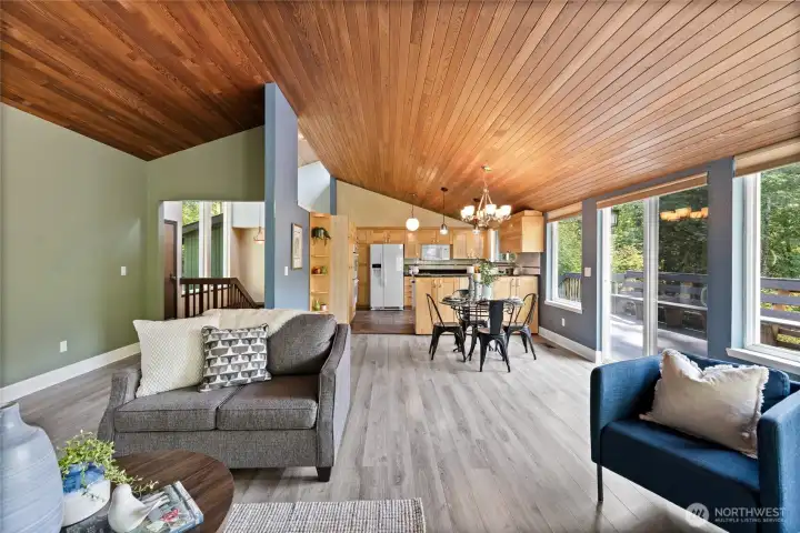 Open to dining area and kitchen