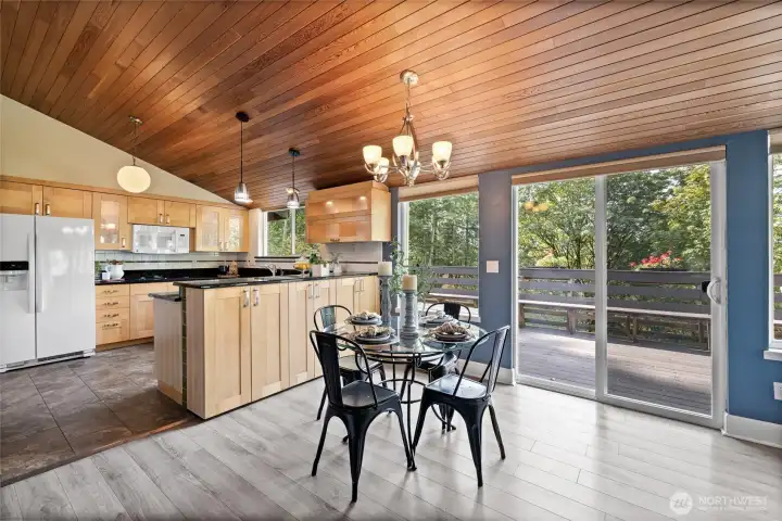 Open dining area out to back upper deck