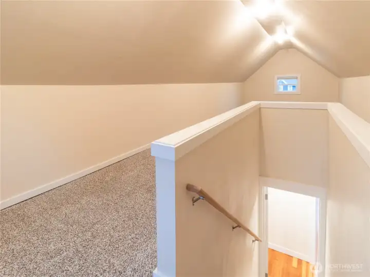 Stairwell leads to second story.