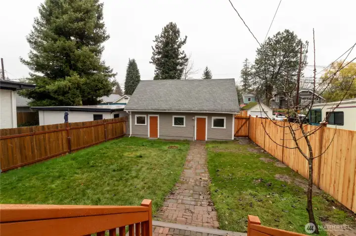 Fairly level backyard allows you to reimagine the space to your personal liking! Detached garage offers the opportunity to create a workshop, Mother-in-law, ADU, or maybe a detached Air BNB for some supplemental income!