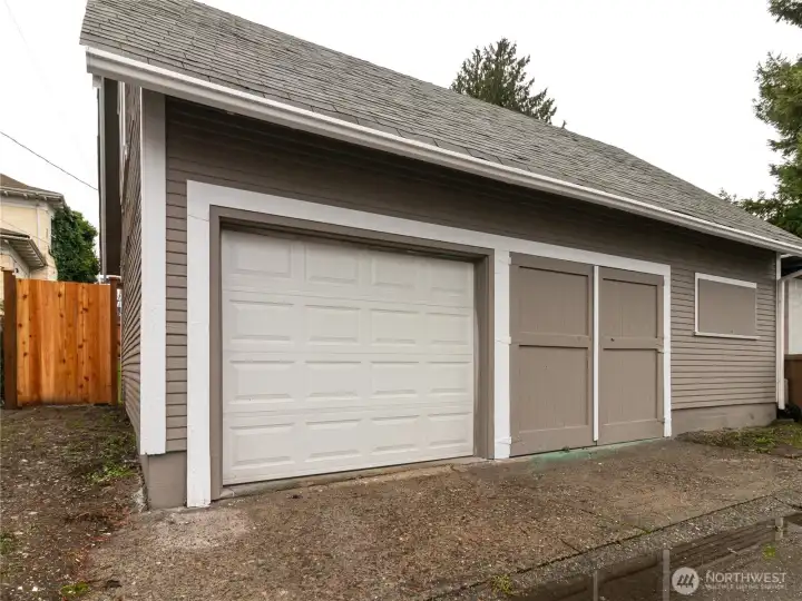 Detached garage has (1) powered garage door and plenty of space for parking.
