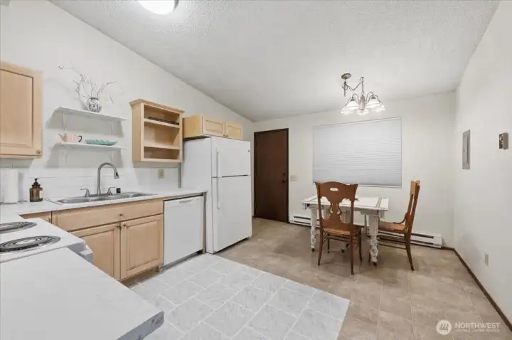 Freshly painted interior. Room for large table. Carport & patio off back door.