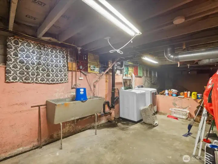 A large unfinished basement offers potential for additional living space