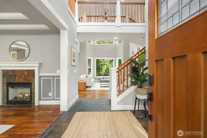 Step inside to soaring ceilings, warm natural finishes, and a light-filled layout designed for effortless living.