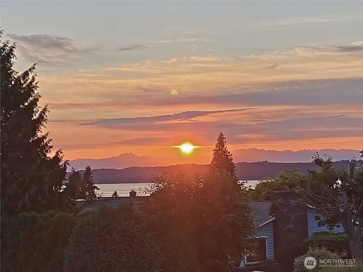 Enjoy vibrant sunsets right from your living area
