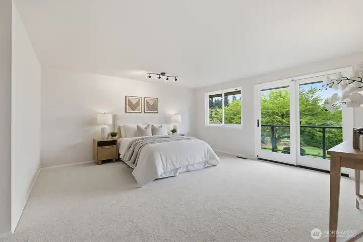 Private primary retreat with direct balcony access