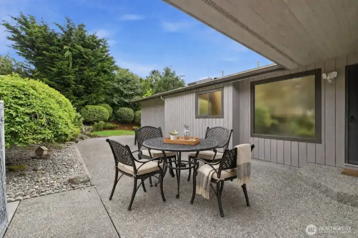 Side patio for additional outdoor enjoyment (virtually staged)
