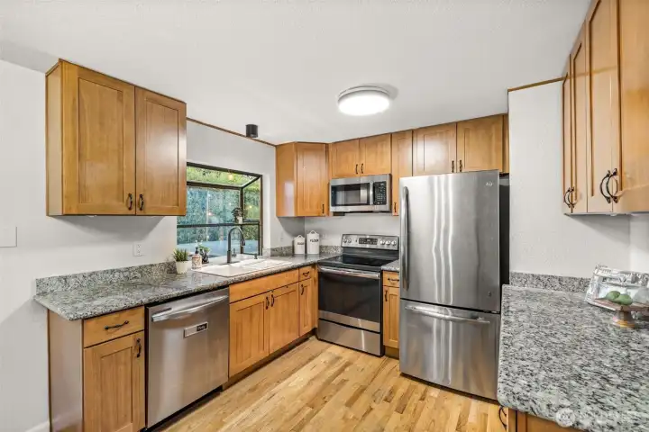 Well-appointed kitchen with stainless steel appliances and plenty of storage.
