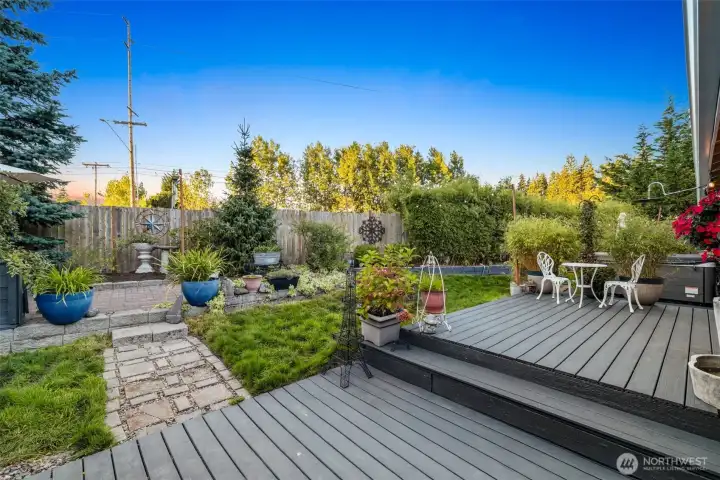Back deck with open views and room to host gatherings.