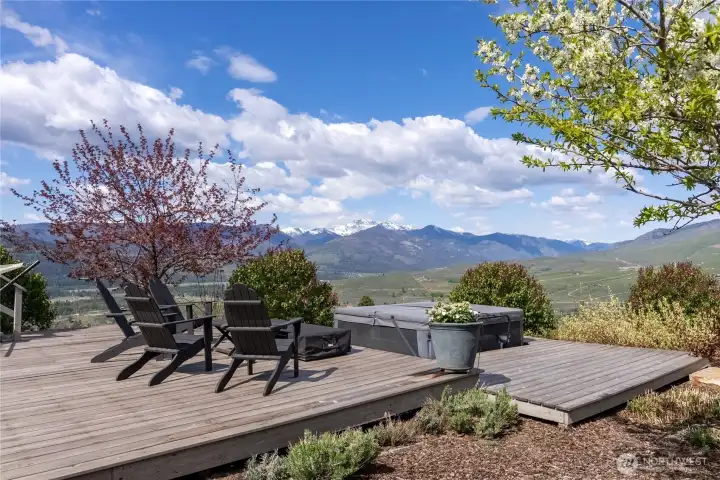 The views!  The privacy!  The hot tub!  Gaze at the snow-capped mountains of the Pasayten Wilderness while soaking up the spring blossoms and fresh air.