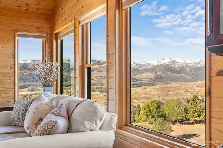 Bringing the outside in- beautiful wood interior frames the incredible views from every window.