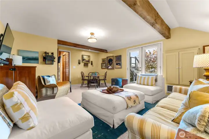 The TV room/den off the main floor.  A sunny gathering space for the whole family!