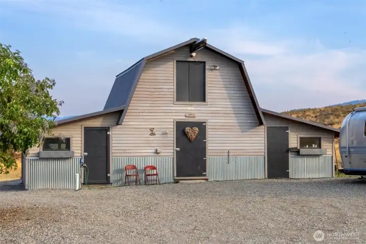 Large seperate outbuilding with insulated room for studio use or projects.
