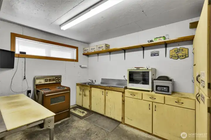 Prep room with walk in cooler for fish / meat