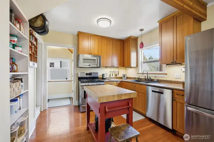 Looking across the kitchen toward the back porch.
