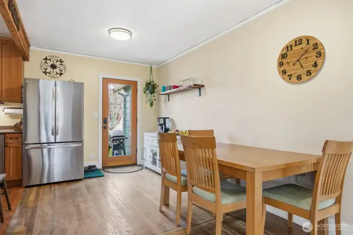 The dining room opens to the rear yard and large deck.