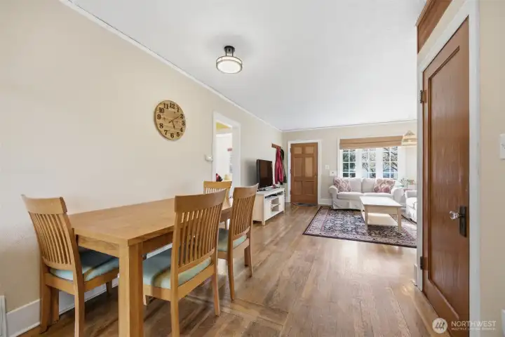 The dining room is open to the living room as well as the kitchen.