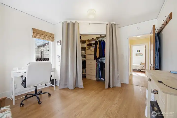 There is a spacious walk-in closet in this generously sized primary bedroom.