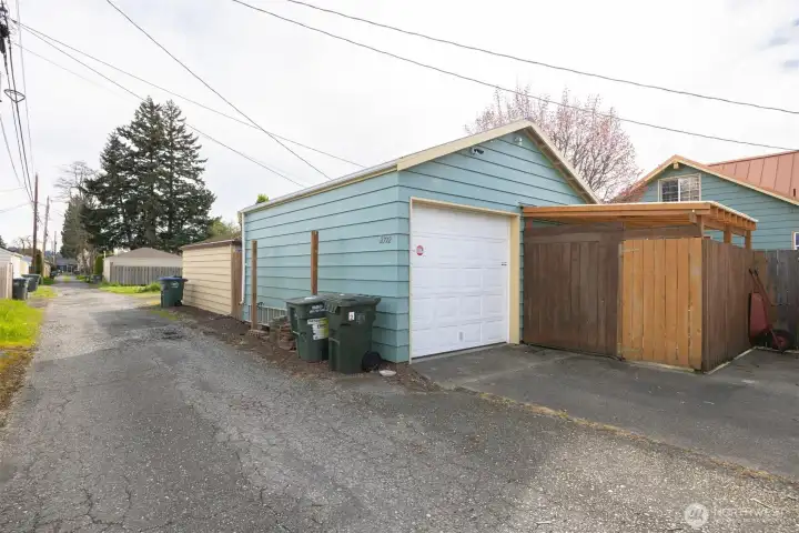 This is the garage/shop and covered patio area off the alley.