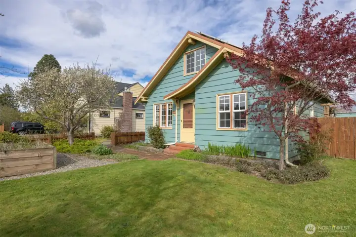 Another view of the west facing front yard and the southerly facing side yard.