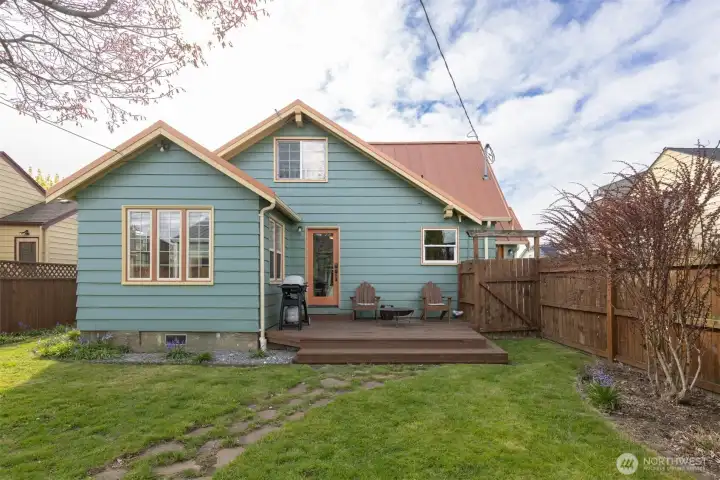Another view of the rear elevation of the home, and perfect BBQ and dining deck.