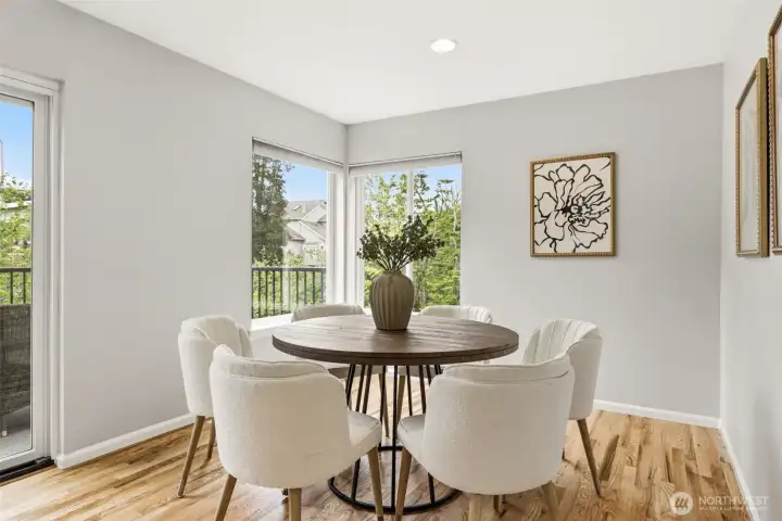 Formal dining space between the kitchen and expanded deck.
