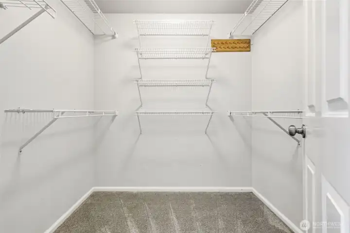 Large primary walk-in closet.