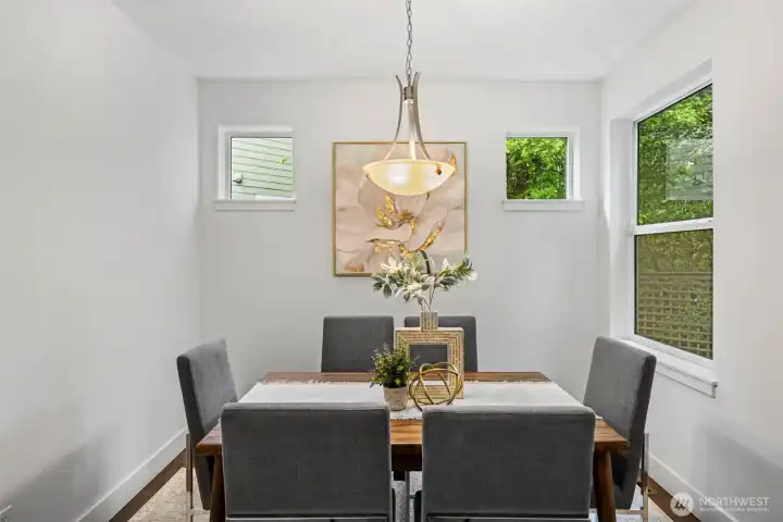 Dining room has multiple windows