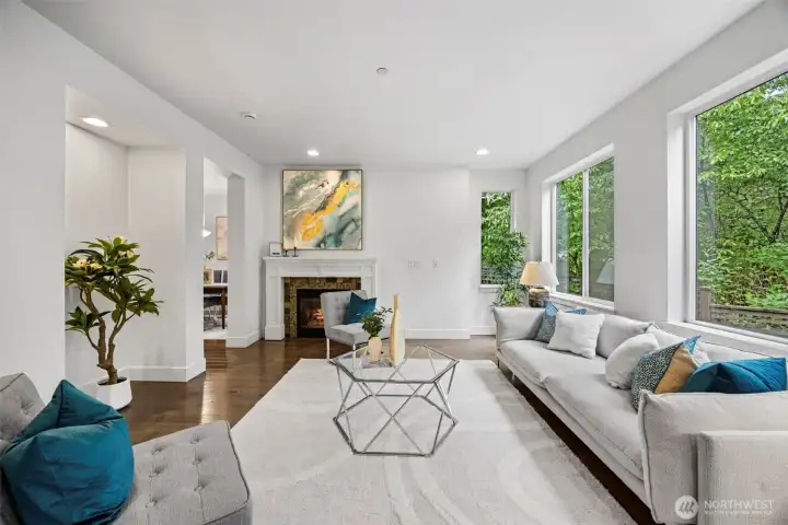 Living room also has multiple windows with full privacy as there is no home behind