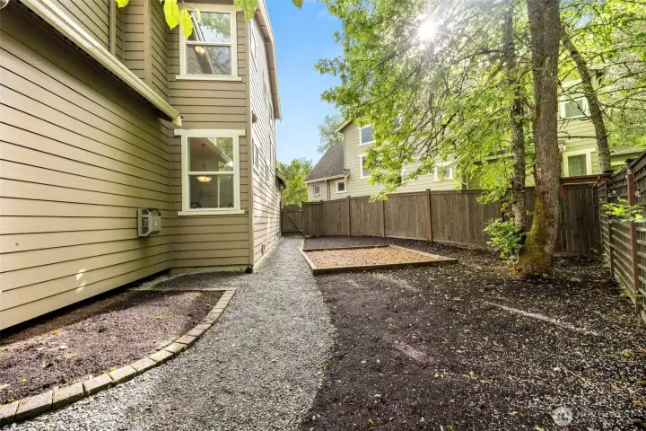 Side yard can accommodate your personal vegetable garden, trampoline, play structure and many more