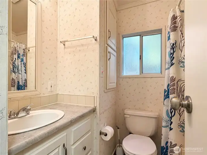 Full bathroom featuring updated fixtures