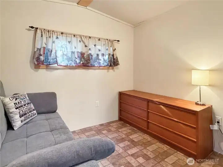 Large solid wood dresser for bedding and other storage as needed.
