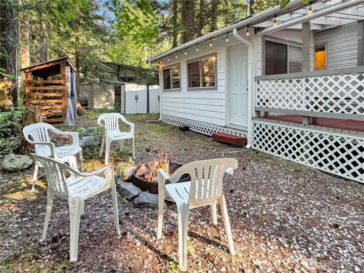 Private fire pit area with comfortable seating space.