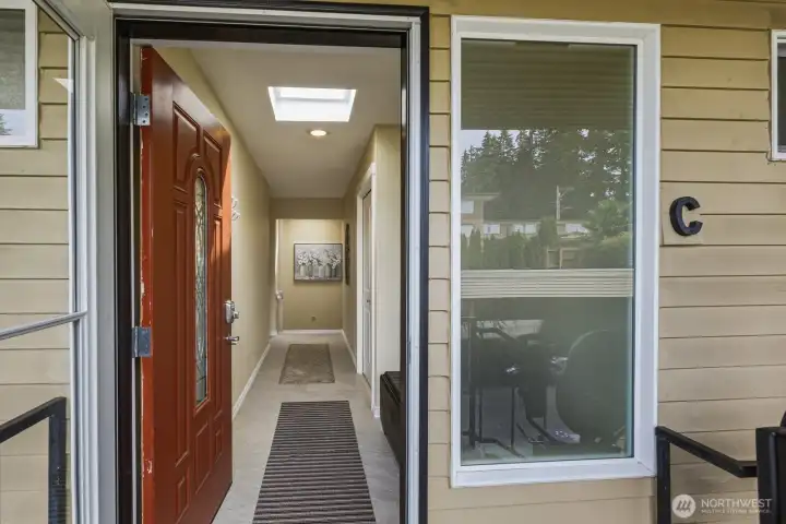 Entry showing stylish tile floor, 9 ft ceiolings, and skylights. Entry showing stylish tile floor, 9 ft ceiolings, and skylights.