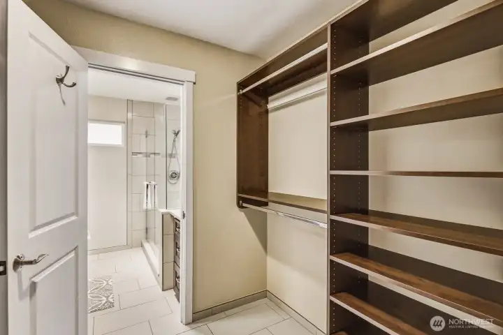 1/2 of the custom woodwork in the walk-in closet. 1/2 of the custom woodwork in the walk-in closet.