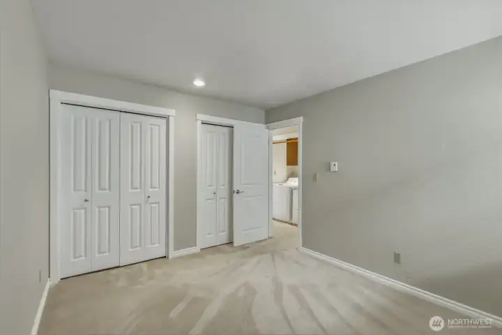 view of guest room with double closets. view of guest room with double closets.