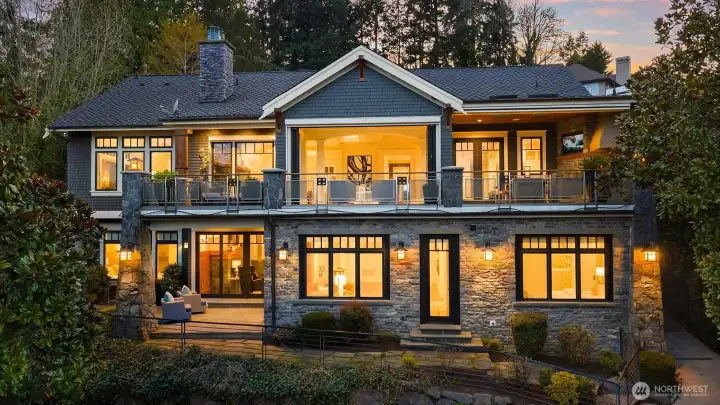 Positioned proudly on the north end of Mercer Island, discover a Modern Craftsman with a charming beachside gust house right at the waters edge. Positioned proudly on the north end of Mercer Island, discover a Modern Craftsman with a charming beachside gust house right at the waters edge.