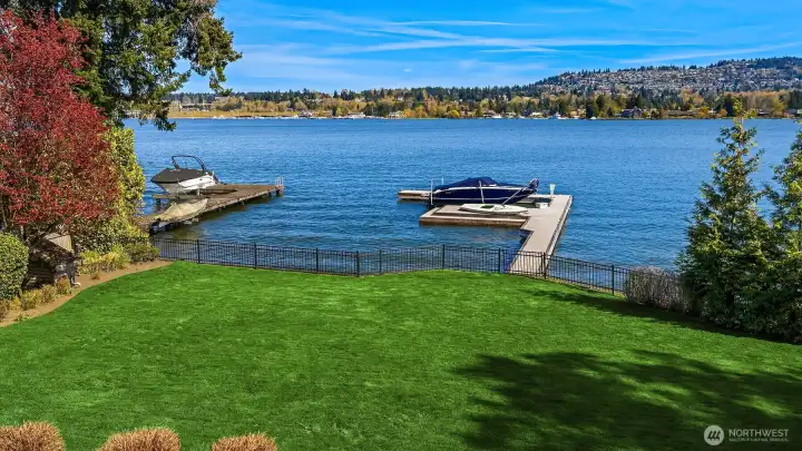 A rolling, football style lawn stretches right to the water's edge perfectly framing the 90 front feet of sparkling waterfront. A rolling, football style lawn stretches right to the water's edge perfectly framing the 90 front feet of sparkling waterfront.