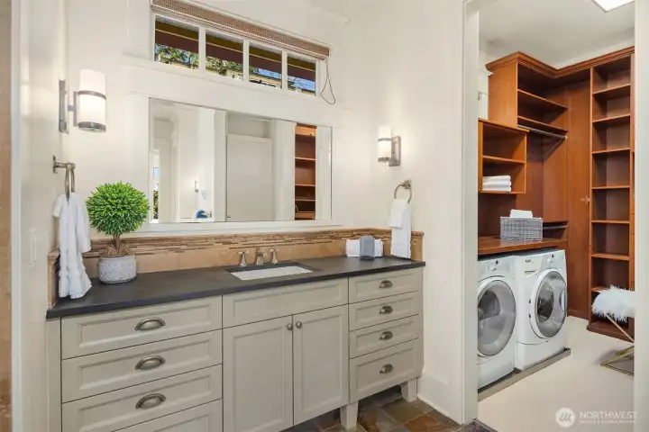 Even the laundry is effortless in the primary suite, with a discrete washer and dryer adding to the spa-level ease. Even the laundry is effortless in the primary suite, with a discrete washer and dryer adding to the spa-level ease.